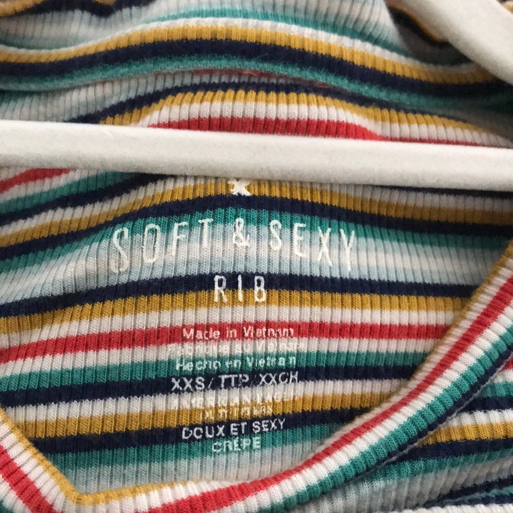 A striped blue,green,white,red,yellow t-shirt. - Picture 2 of 4